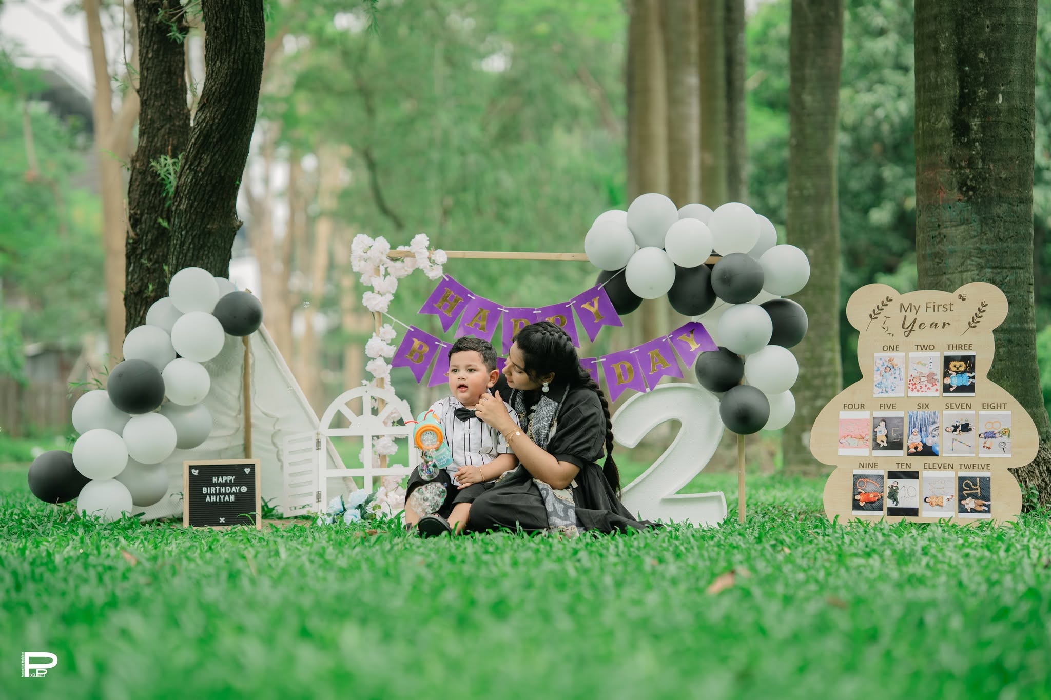 Outdoor second birthday theme with family